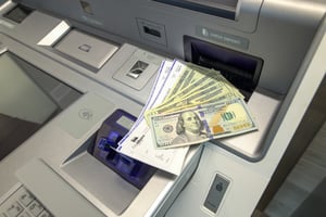Withdrawing and depositing cash and checks on an advisor supported kiosk at first alliance credit union