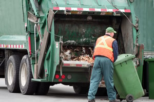 Garbage man with truck