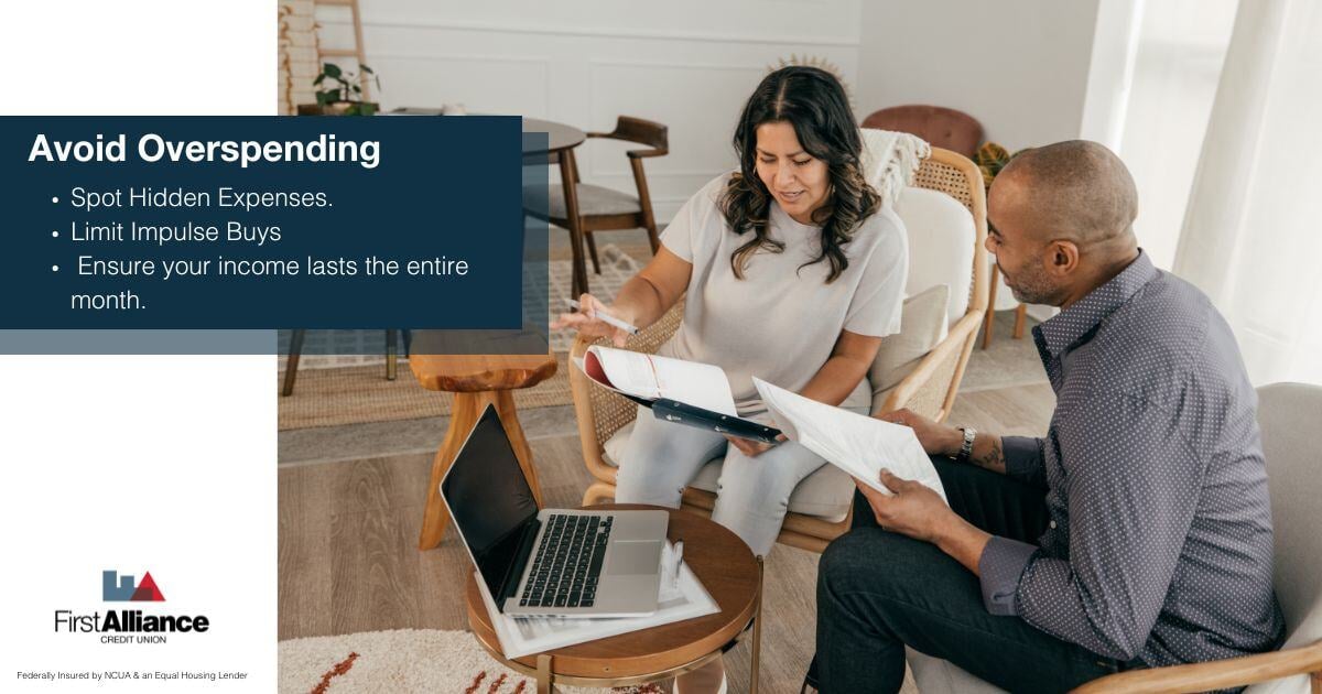 Advantages of a Budget - a couple looking over finances