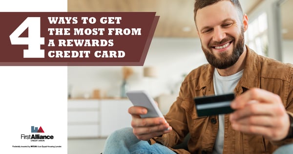 man holding credit card with text overlay 4 ways to get the most from a rewards credit card