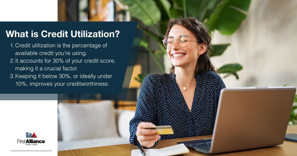 Credit Utilization &amp; Your Car Loan - a woman smiling near a laptop