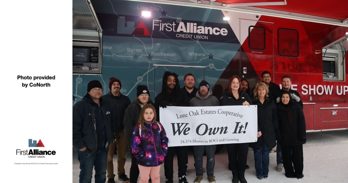 Helping Preserve Affordable Housing in MN Lone Oak Estates Becomes A Resident-Owned Community, group in front of First Alliance Mobile Branch