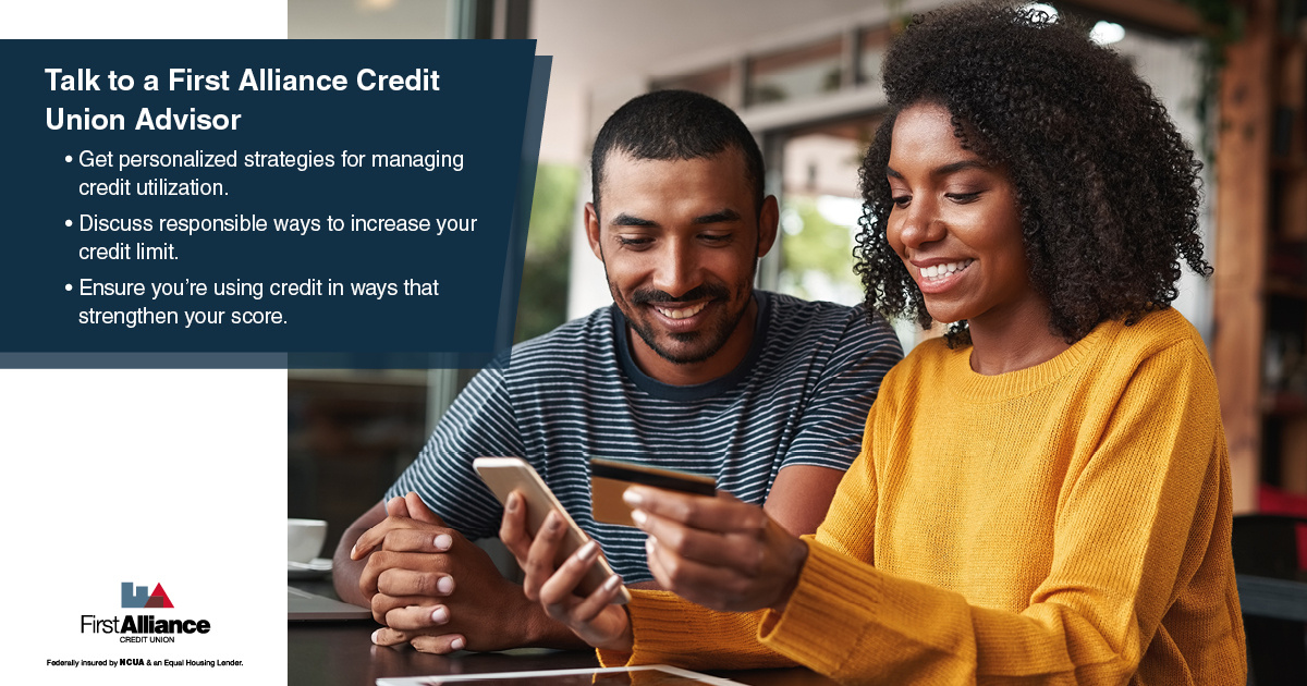 How Much of Your Credit Card Should You Use - a couple looking at their credit card