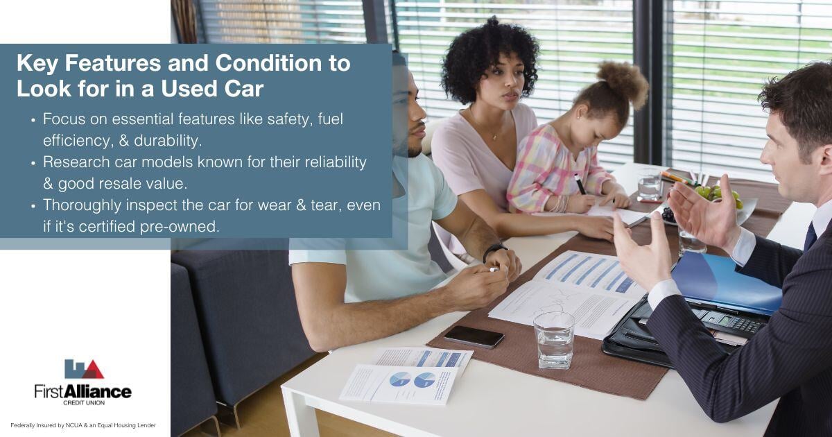 How to Buy a Used Car - a family talking to an Credit Union Member