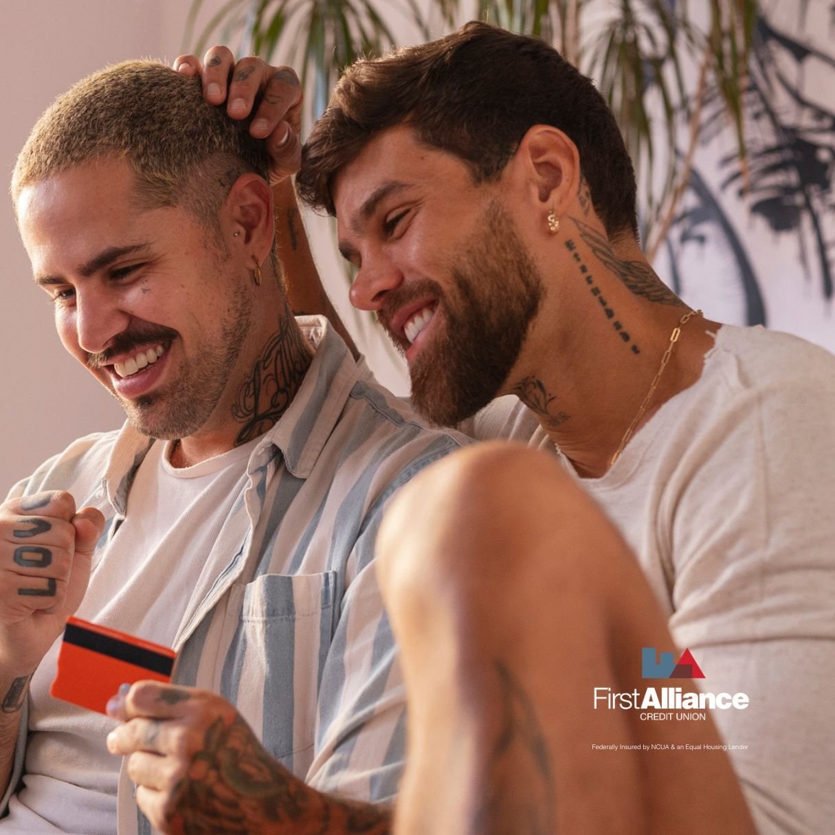 couple setting financial goals, two men smiling