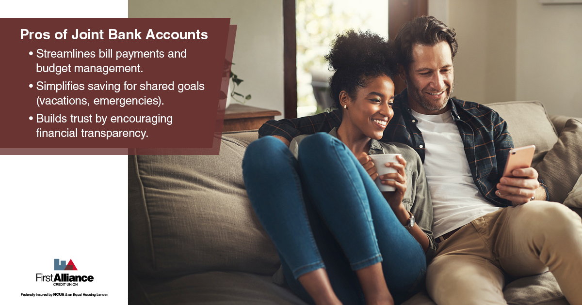 joint bank account - couple looking at their phone