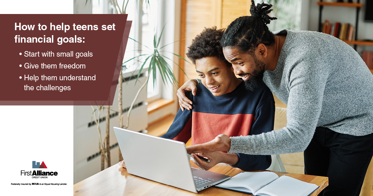 Teen Goals - a father helps his son on a computer