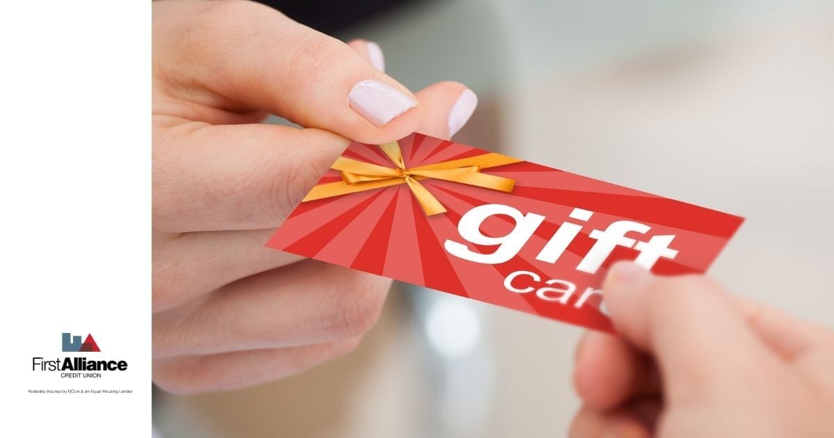 red gift card in hand