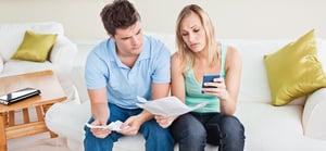 Couple calculating bills | First Alliance Credit Union