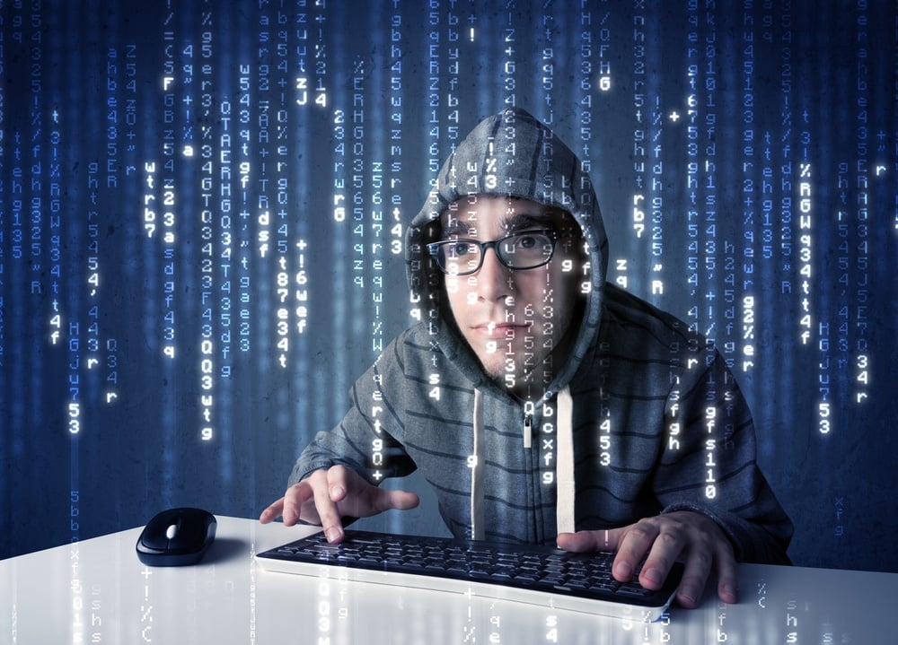 Identity thief at keyboard