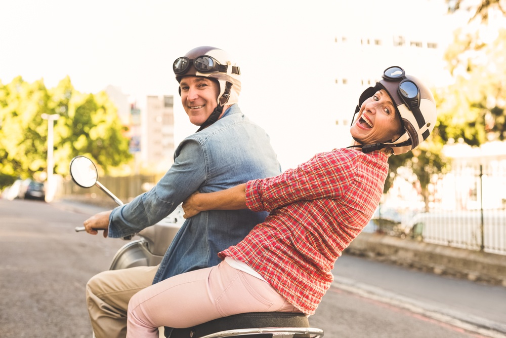 Couple on Scooter | First Alliance Credit Union