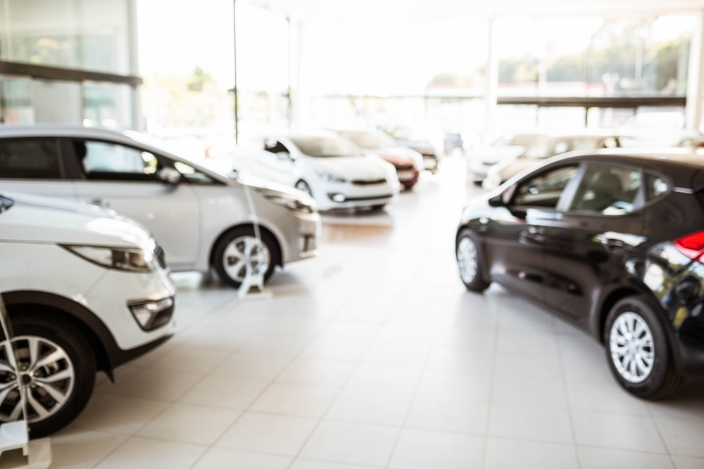 cars lined up at a dealership