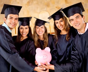 Graduates with a piggybank