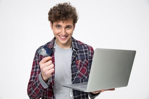 Man with laptop | First Alliance Credit Union