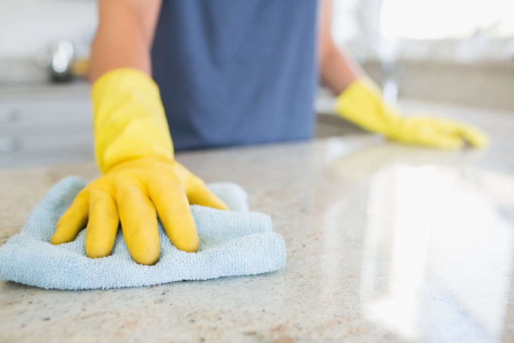 Woman deep cleaning house