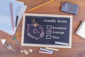 Piggy bank credit score drawing on a chalkboard