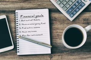 Financial goals on notebook