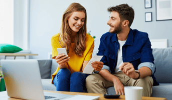 Couple planning with a laptop