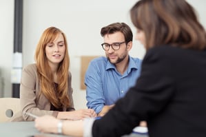 Couple talking about a trust with an attorney