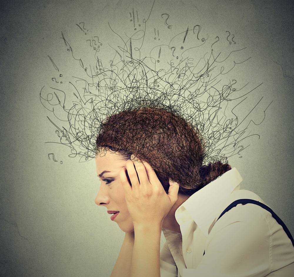 Woman with thoughts above her | First Alliance Credit Union
