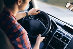 Man driving in car