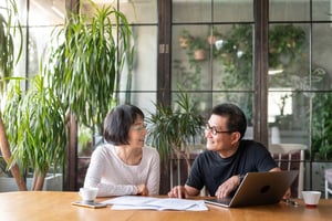 Couple With Papers | First Alliance Credit Union