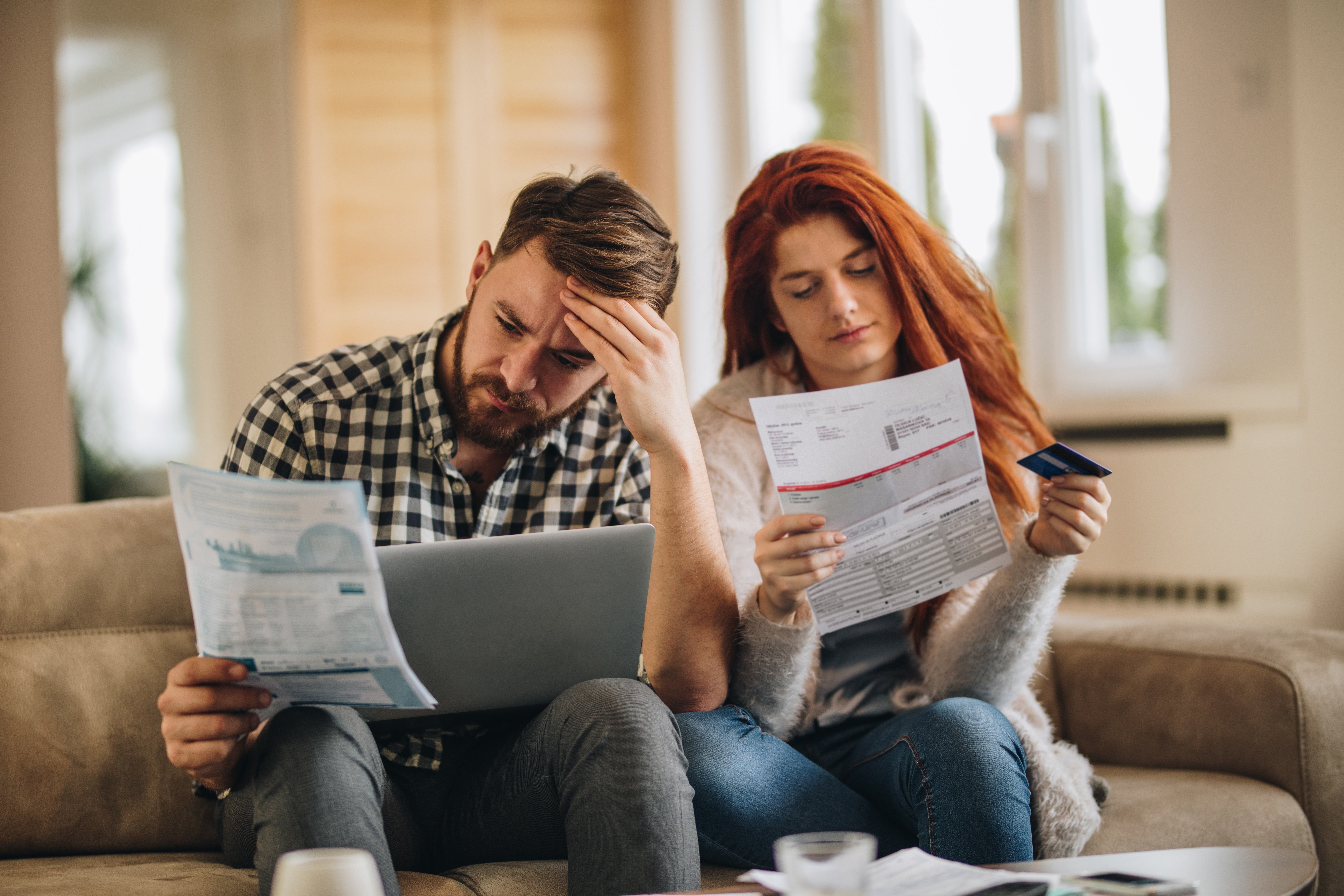 Couple reading loan information