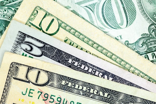 Close up of American money | First Alliance Credit Union