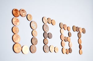 Debt spelled out in pennies | First Alliance Credit  Union
