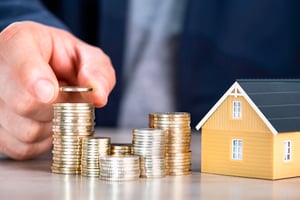 Coins and model home 