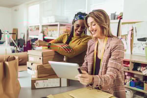 Two small business women talking
