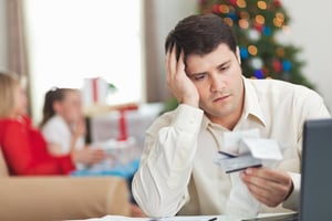 Worried man with credit card