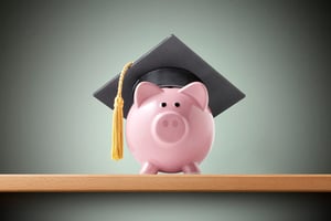 Piggy bank with mortarboard cap