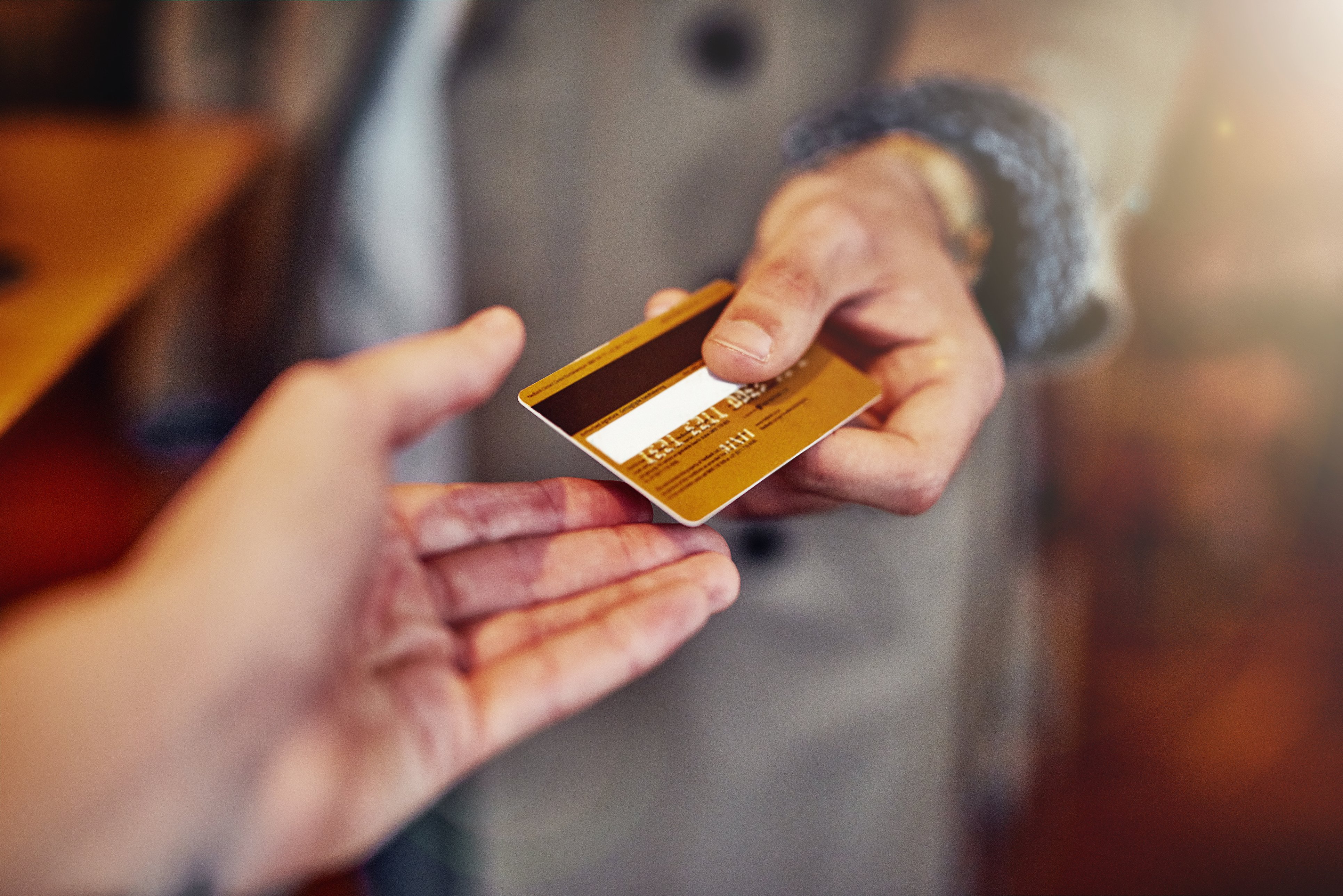 Credit card changing hands