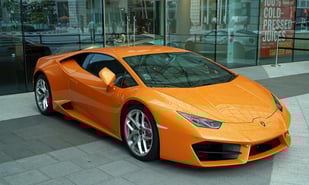 Lamborghini in front of store