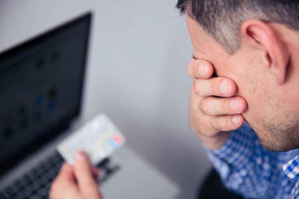 man sad that he fell victim to gift card scam | first alliance credit union