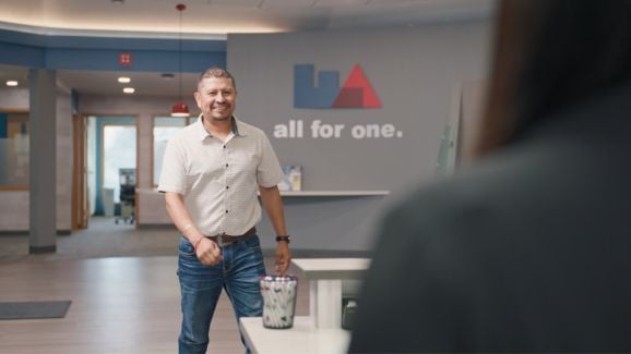 Roberto walking in First Alliance